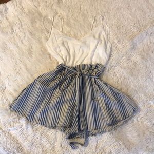 Really cute boutique romper. Never worn